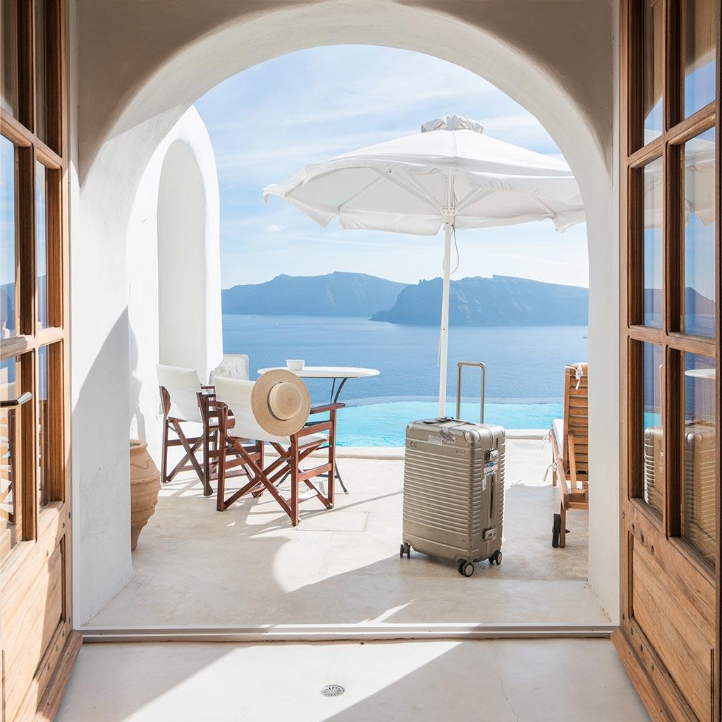 Suitcase on a seaside terrace